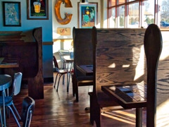 A view inside of Cappy's Pizza in Cedar Rapids, IA. Hand made custom booths.